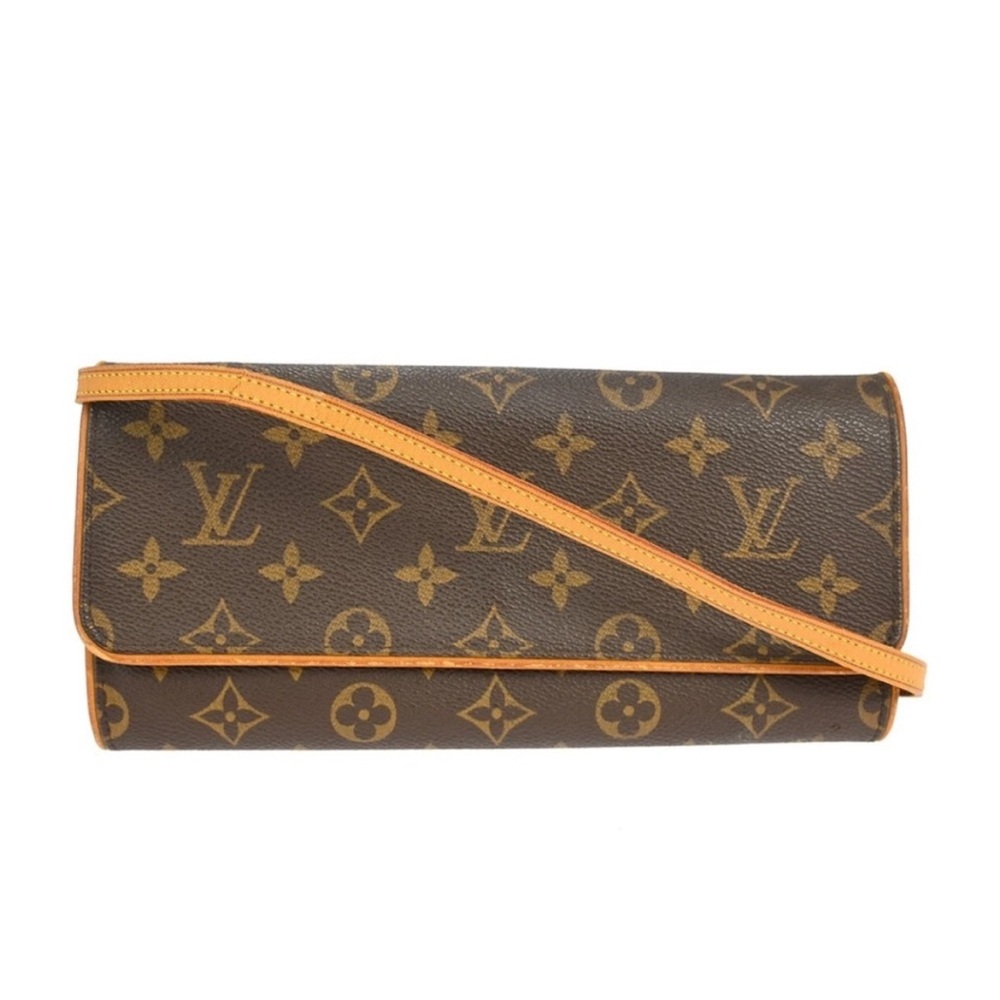 Louis Vuitton Monogram Brown and Tan Clutch. To small for my needs